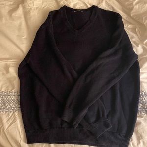 Brandy Melville Navy V-neck sweater.
